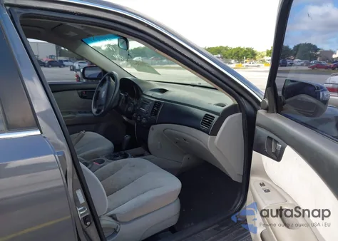 2009 Kia Optima Lx z USA, uszkodzony, nr VIN KNAGE228295310954